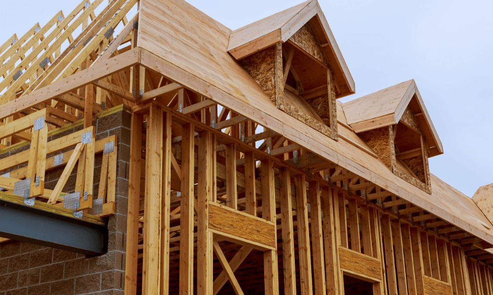 Construction to Perm Image of house being framed