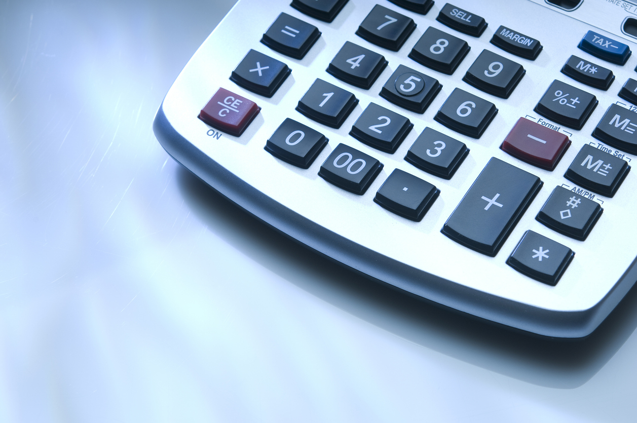 Financial calculator on a sky blue background