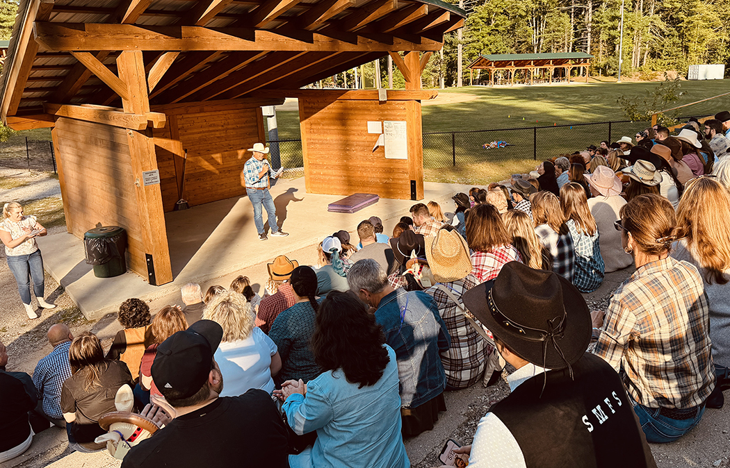 St. Mary's Bank Employees listening to Ken Senus Speak at Annual Camp Foster Outing