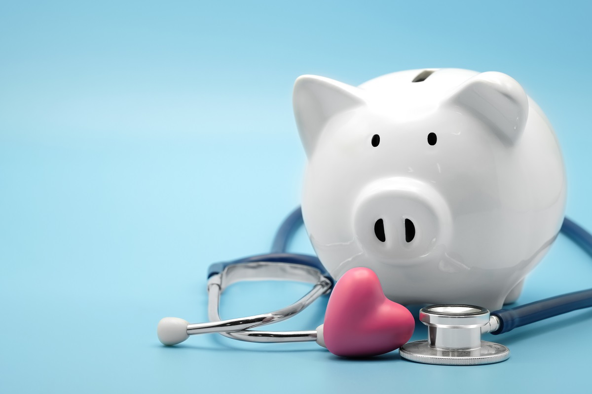 Piggy bank with a medical stethoscope