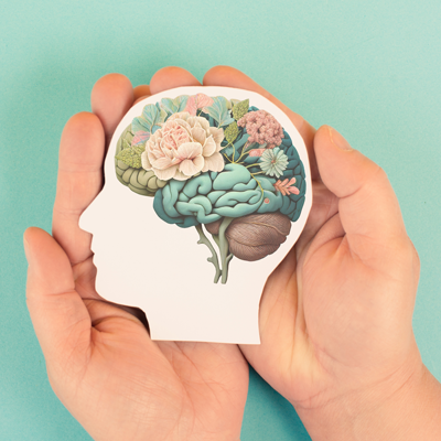 Psychology of spending hands holding colorful brain picture