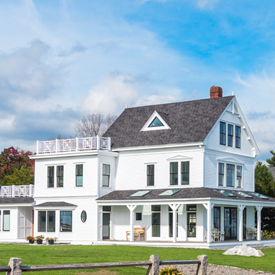 A beautiful white house that was purchased using a jumbo loan from St. Mary's Bank.