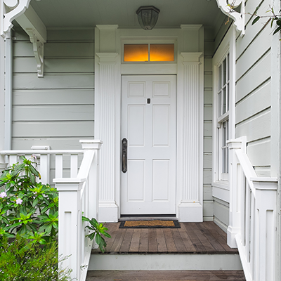 Elegant front door of a house, symbolizing welcoming entry and homeownership, ideal for St. Mary’s Bank mortgage services