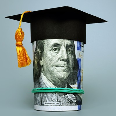 Stack of $100 bills with a graduation cap, symbolizing student loans and financial support from St. Mary’s Bank.