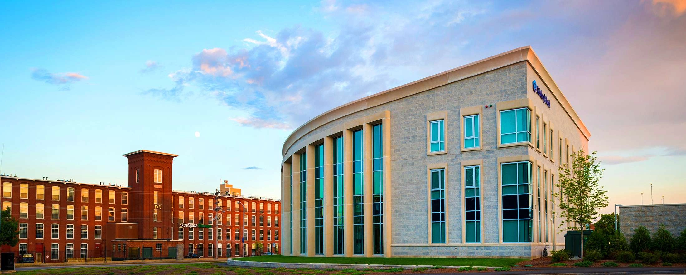 Exterior of St. Mary’s Bank’s Manchester NH branch, featuring the brick building, main entrance, and bank signage.