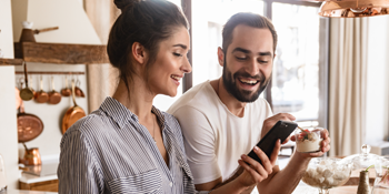 Member making an online loan payment at St. Mary’s Bank New Hampshire via secure portal.
