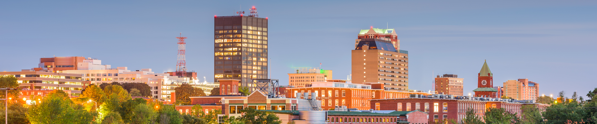 City panorama of Manchester NH in the evening